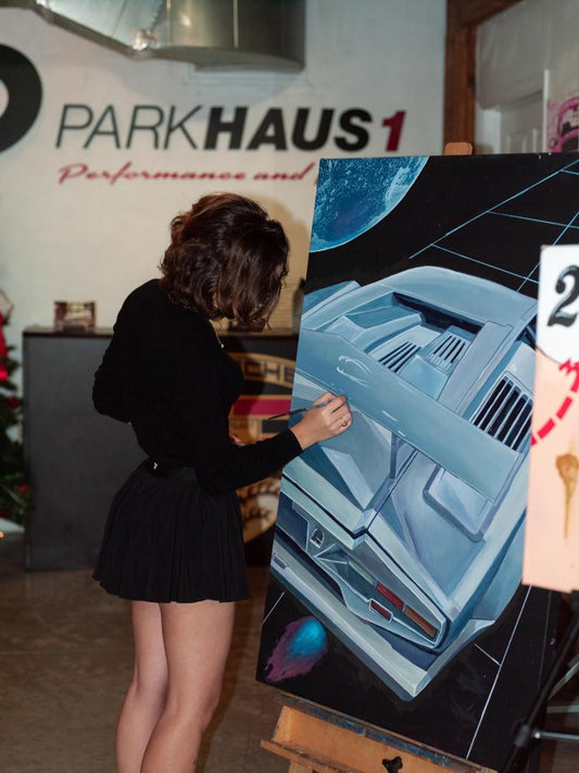 Live painting at Parkhaus1 cars and coffee